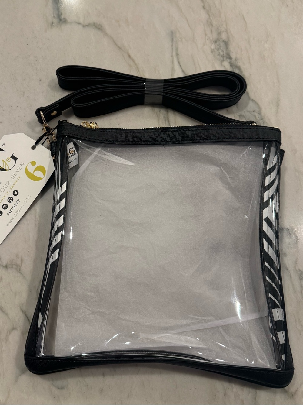 NWT OTG247.com Clear Crossbody Bag with Black Trim and adjustable strap.